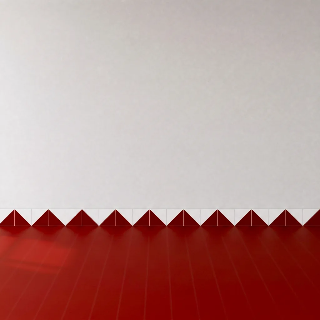 Azulejo Trigone Blanco 10x10 Rojo Brillo formando una banda decorativa en una pared