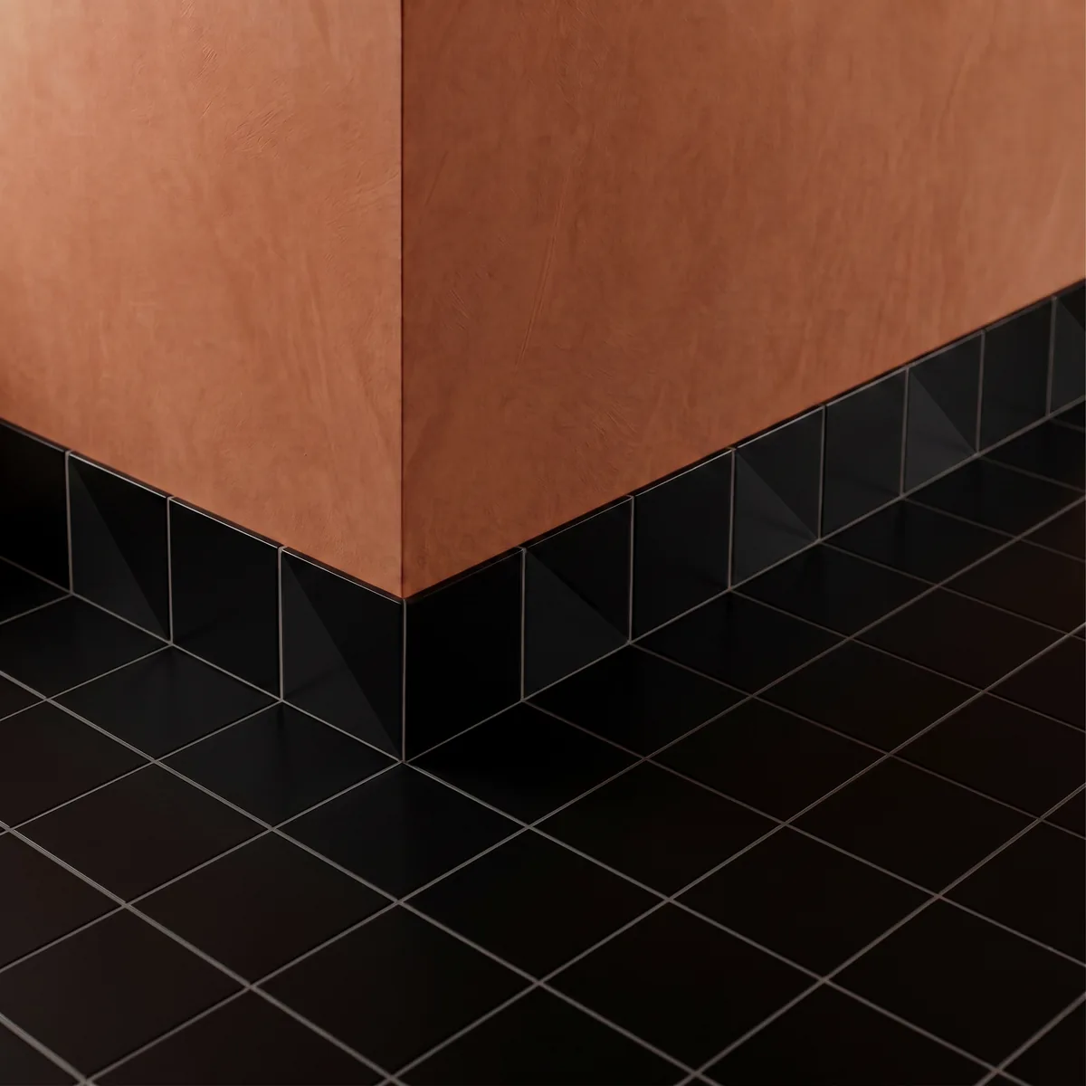 Azulejo Trigone Color 10x10 Negro Mate colocado como cenefa en un suelo